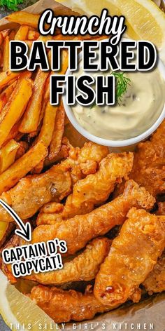 the cover of crunchy battered fish magazine features fried chicken, fries and lemon wedges