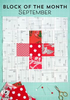 a red and white patchwork quilt next to scissors