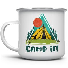 a camp it mug with a tent and trees in the background