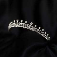 a tiara is shown on a black background