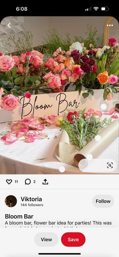 an iphone photo with flowers on it and the caption bloom bar below that reads