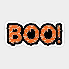 an orange sticker with the word boo written in black and white letters on it