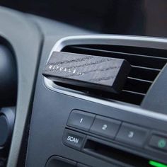 an air vent in the dashboard of a car