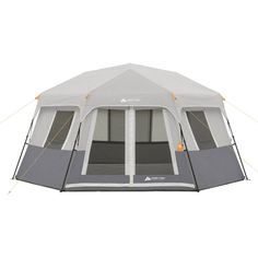 a tent with the door open and two windows closed, on a white background in front of it