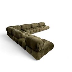 a very long couch that is made out of some kind of material