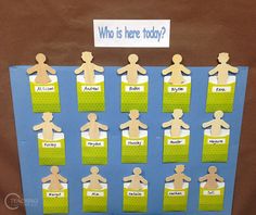 a bulletin board with paper cutouts of people and words that say who is here today?