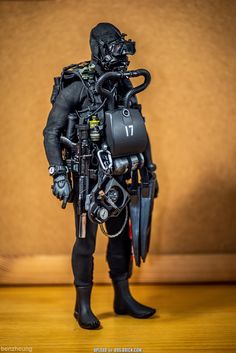 a man dressed in scuba gear and diving equipment