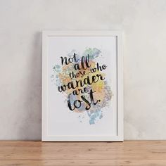 a watercolor painting with the words not all who wander are lost in it on a shelf