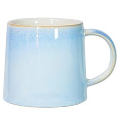 a blue and white coffee mug on a white background