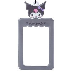 a metal frame with a cat on it and the word kuromi written in black