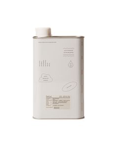 a white can that has some kind of substance on it's side and is sitting in front of a white background