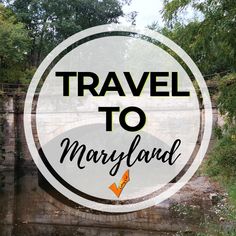 the words travel to maryland are in front of a river and bridge with trees