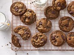 chocolate chip cookies and milk on a cooling rack