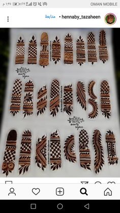 some brown and white nail designs on a sheet of paper with the words hennaby - tazhen