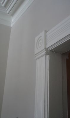 the corner of a room with white trim