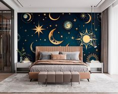 a bedroom decorated with stars, moon and crescents on the night sky wallpaper