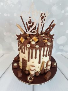 a birthday cake with chocolate and white frosting