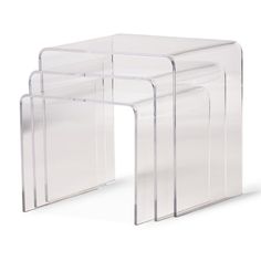 three clear acrylic nesting tables on white background