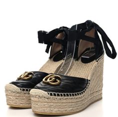 This Is An Authentic Pair Of Gucci Nappa Matelasse Gg Marmont Ankle Wrap Platform 35/120mm Espadrille Wedges In Black. These Chic Wedges Feature Black Woven Uppers With Canvas Ankle Straps, An Aged Gold Interlocking Gg Logo, And A 4.5 Inch Jute Heel With A 1.25 Inch Platform Brand New With Dustbags. Made In Italy. Elegant Gucci Wedge Heel Sandals, Gucci Wedge Heel Sandals, Gucci Designer Wedge Heel Sandals, Gucci Wedge Heel Sandals With Branded Heel, Gucci Espadrilles, Platform Espadrille Sandals, Canvas Loafers, Slip On Espadrilles, Gucci Horsebit