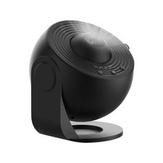 a black speaker sitting on top of a stand