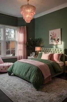 a green and pink bedroom with a chandelier