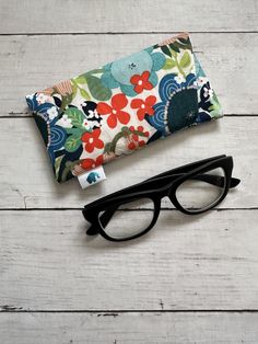 Carry your eyeglasses and sunglasses in style with this soft, fabric glasses case. Made of 100% cotton fabric lined with fleece, these cases will protect your glasses from scratches on the go. Glasses easily slide in and out of these cases because there is no closure to fiddle with. Cases will also fit a wide variety of glasses, from the trendy oversized sunglass frames to the more compact reading ones. Keep you glasses safe, scratch- and dust-free whether in your purse, tote bag, car or on your Glasses Cases, Eyeglasses Case, Glass Case, Dust Free, Eye Wear Glasses, Eyeglass Case, Glasses Case, Sunglass Frames, Eyewear Sunglasses