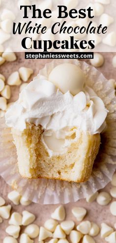 the best white chocolate cupcakes with whipped cream on top