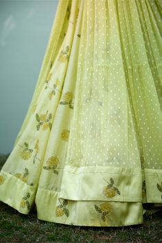 Radiate sophistication in this canary yellow hand block printed angrakha lehenga set, embellished with captivating lurex patchwork and intricate thread embroidery. Paired gracefully with an organza dupatta, this ensemble exudes elegance and charm. Crafted with meticulous attention to detail, it's the perfect choice for those seeking to make a stylish and memorable statement at any special occasion. Pista Green Sharara With Printed Motifs For Wedding, Yellow Chanderi Sharara With Printed Motifs, Yellow Floor-length Salwar Kameez With Sheer Dupatta, Yellow Anarkali Set With Traditional Drape And Printed Motifs, Yellow Chanderi Anarkali Set With Cutdana, Pista Green Chanderi Anarkali Set With Printed Motifs, Festive Yellow Anarkali Set With Chikankari Embroidery, Yellow Anarkali Set With Chikankari For Festive Occasions, Yellow Sharara With Printed Motifs For Navratri