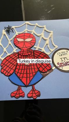 a card with a spider on it and the words turkey in disque written below