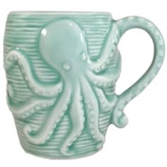 an octopus mug is shown on a white background