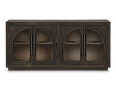 the sideboard with glass doors is shown in dark wood and has an arched design