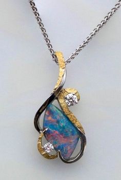 Hand made Australian opal pendant with diamonds and natural Alaskan gold nuggets.  Visit us online at: www.goldrushfinejewelry.com Opal Necklaces, Nugget Jewelry, Opal Rock, Gold Nugget Jewelry, Australian Opal Pendant, Soldered Jewelry, Earrings Opal, Jewelry Opal, Soldering Jewelry