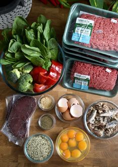 the ingredients for this meal include meat, eggs, tomatoes, broccoli and spinach