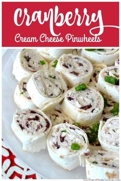 cranberry cream cheese pinwheels on a white plate with red and white napkin