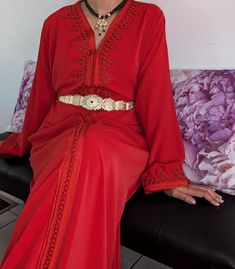 Premium quality handmade silk crepe red Moroccan kaftan. The black belt is included. Important Note: Stainless steel gold belts are not included. Please contact us for more information. This caftan is ideal for family occasions such as family celebrations, the month of Ramadan, Eid, or weddings. Several sizes available. It is also possible to personalize your caftan according to your taste, contact us for more information. Top quality kaftan, handy made. The black belt is included This caftan is ideal for family occasions such as family celebrations, the month of Ramadan, aid, or weddings. Several sizes available, it is possible to have it in Matchi-Matchi version: mom/daughter. It is also possible to customize your caftan according to your taste, contact us for more information Red Traditional Drape Kaftan For Party, Luxury Wedding Abaya, Elegant Formal Kaftan With Traditional Drape, Elegant Red Kaftan With Traditional Drape, Elegant Red Long Sleeve Abaya, Elegant Long Sleeve Red Abaya, Red Kaftan For Traditional Ceremonies, Elegant Red V-neck Kaftan, Elegant Red Abaya For Festive Occasions