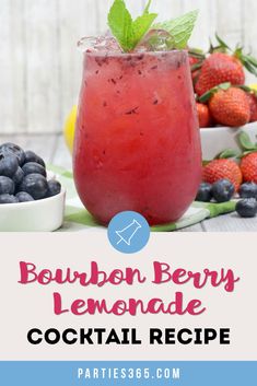 the bourbon berry lemonade cocktail is served in a glass with fresh berries and mint