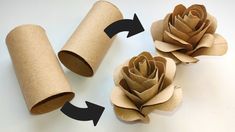 three rolls of toilet paper with one rolled up and the other rolled down to make a flower