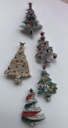 Stunning Enameled Rhinestone Christmas Tree Pins Show your holiday spirit with one of these beautiful trees! FREE SHIPPING via USPSAllow from 2 to 5 Days for DeliveryVisit our online collectible store for more! One-of-a-Kind Seasonal Christmas Tree, Tree Blocks, Beautiful Trees, Holiday Pins, Holiday Calendar, Christmas Pins, Silver Tree, Christmas Past, Garden Stuff