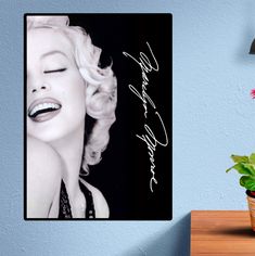 marilyn monroe autographed on the back of a poster