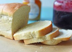 a loaf of bread sitting on top of a cutting board