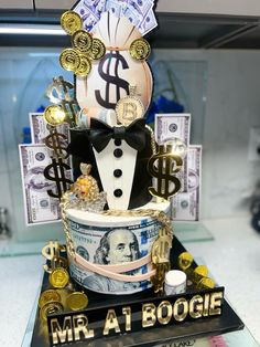 a cake made to look like it has money on top