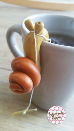 a hot dog in a mug is tied to the side