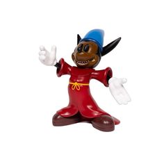 a toy figurine that looks like a dog wearing a red outfit and blue hat