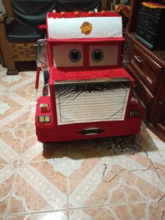 a toy firetruck made to look like it's from the movie cars