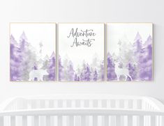 two purple and white paintings on the wall above a crib