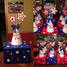 the table is set up with red, white and blue party hats on top of each other