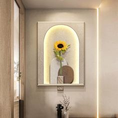 a vase with a sunflower in it sitting on a shelf next to a mirror