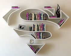 the bookshelves are shaped like an arrow