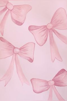 three pink bows on a light pink background