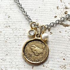 clear view of bird coin necklace charms Triple Charm, Jewelry Accessories Ideas, Bird Necklace, Bird Jewelry, Fresh Water Pearl, Royal Jewelry, Coin Necklace, Coin Pendant, Gold Coins